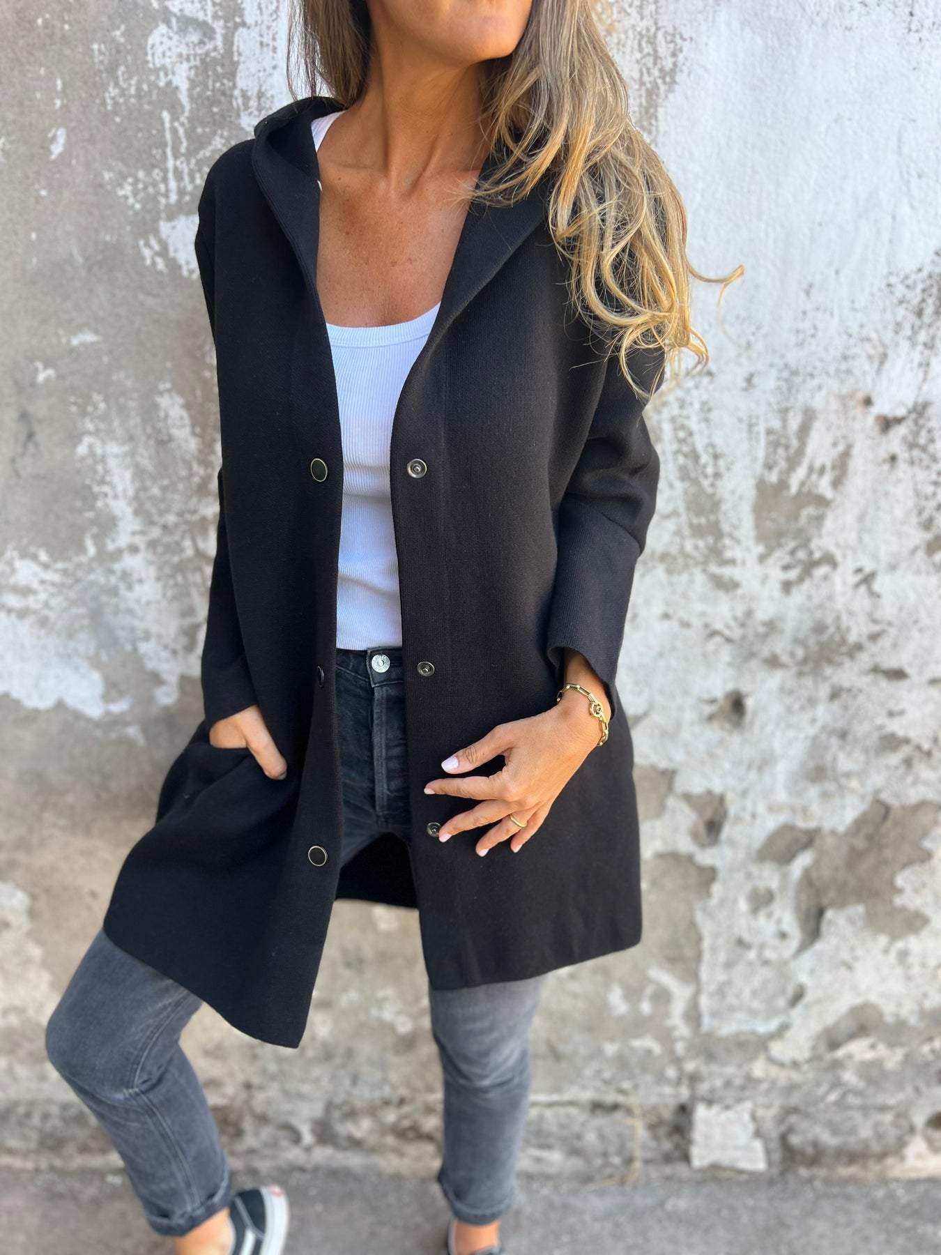 Stylish fashionable women's hooded jacket for transitional weather